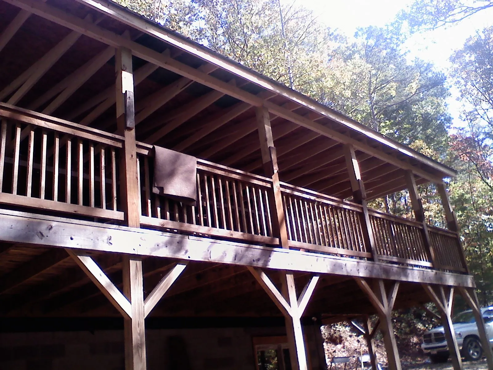 Timber framing under a new elevated porch and deck — Roof Leak Repair in Imler by Roofing Brothers